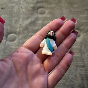 Miniature Figurine with Blue and White Robe